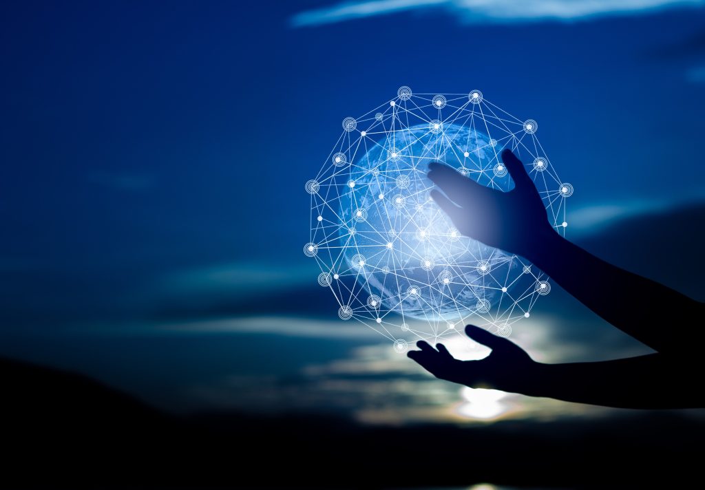 Abstract science, circle global network connection in hands on night sky background  / Blue tone concept